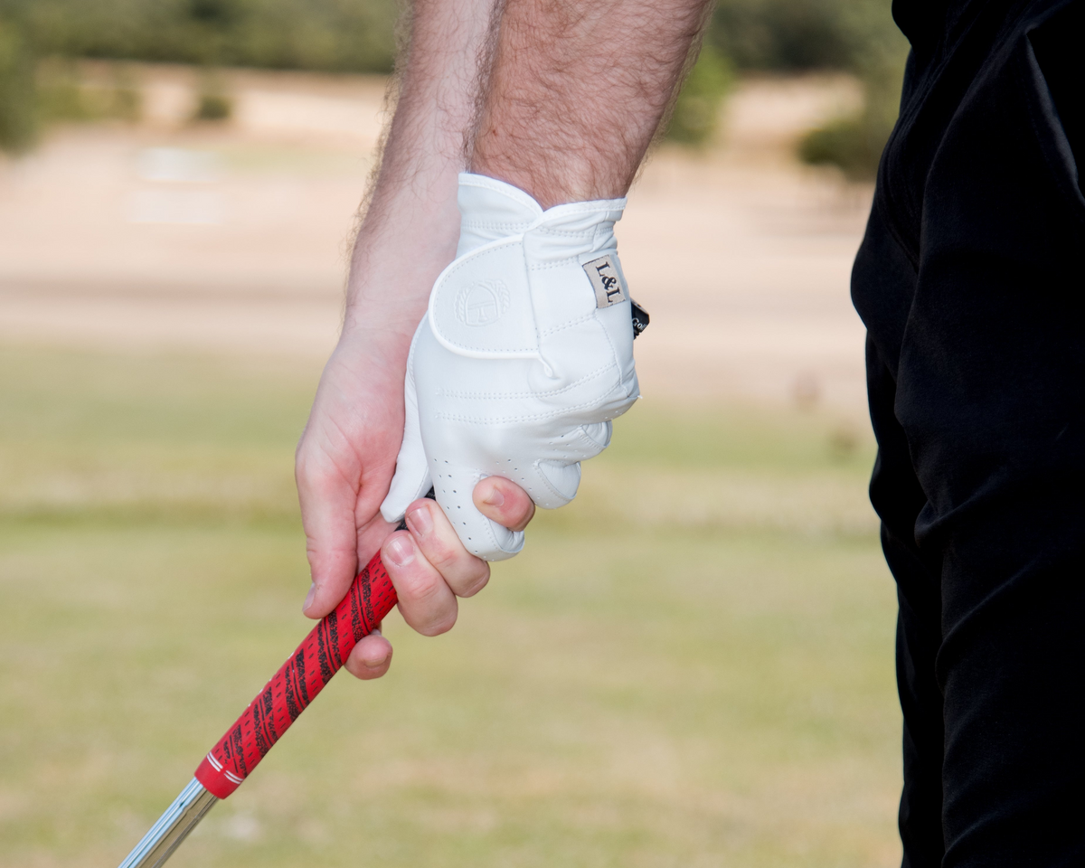 White Links And Leather golf glove ready for play